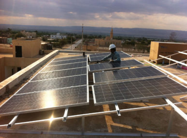 Installing solar systems as part of the eco-village project in Fefa, Jordan