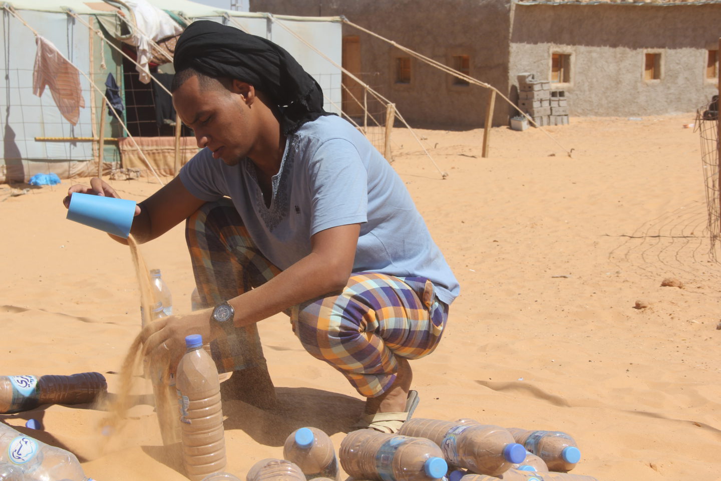 The story of a young refugee who builds houses from plastic bottles | The Switchers